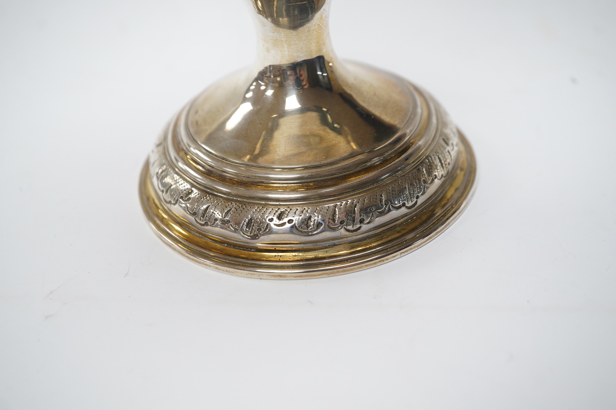 A George II silver goblet, with later embossed decoration and inscription, maker RB London, 1728, 16.6cm, 8.9oz. Condition - fair